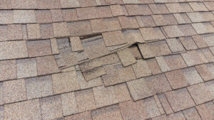 wind damaged shingles